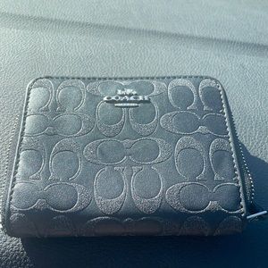 A black coach wallet
